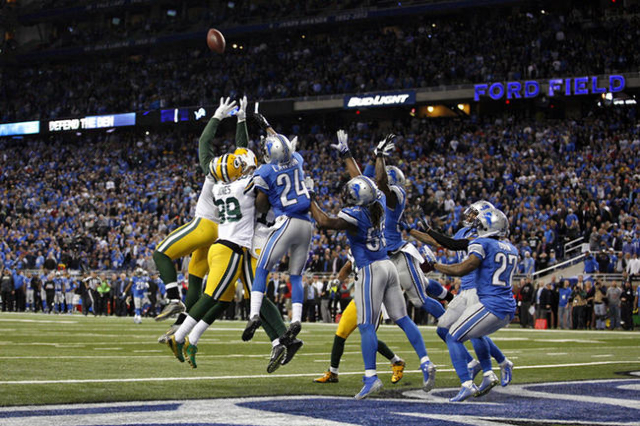 Dec 3, 2015; Detroit, MI, USA; Green Bay Packers quarterback Aaron Rodgers (not pictured) completes a touchdown pass to tight end Richard Rodgers (82) during the fourth quarter with no time remain ...