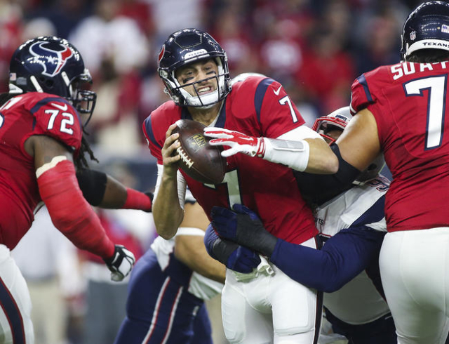 Houston Texans quarterback Brian Hoyer (7) is sacked by New England Patriots  defensive tackle Dominique Easley (99) during the first half at NRG  Stadium. The Patriots defeated the Texans 27-6. Man …