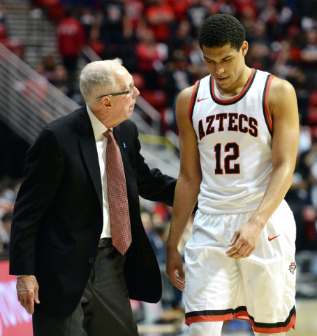 Dec 22, 2015; San Diego, CA, USA; San Diego State Aztecs head coach Steve Fisher talks to guard Trey Kell (12) during the second half against the Kansas Jayhawks at Viejas Arena at Aztec Bowl. Man ...