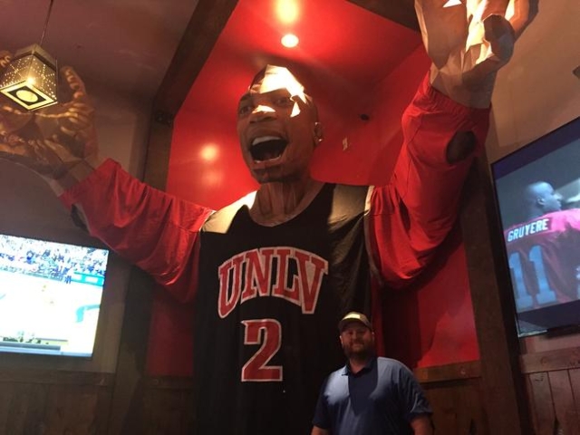 PKWY Tavern General Manager Dave Campion poses in front of Khem Kong on Wednesday, Dec. 2, 2015. The tavern acquired the 20-foot recreation of former Rebel Khem Birch last month from UNLV‘s  ...