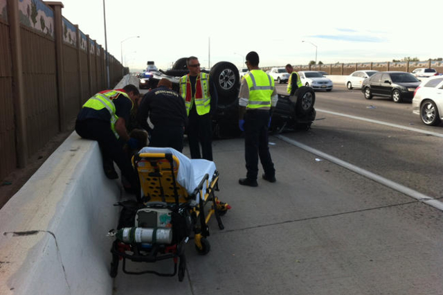 A single-vehicle rollover accident is causing delays on northbound U.S. Highway 95 near Charleston Boulevard on Thursday morning. (Michael Quine/Las Vegas Review-Journal)