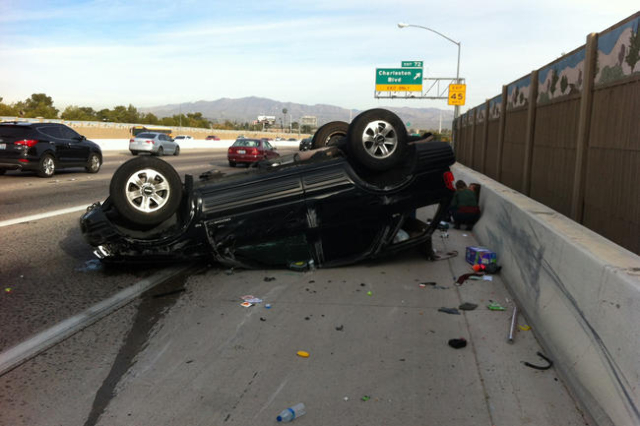A single-vehicle rollover accident is causing delays on northbound U.S. Highway 95 near Charleston Boulevard on Thursday morning. (Michael Quine/Las Vegas Review-Journal)
