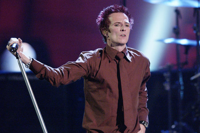 Velvet Revolver lead singer Scott Weiland performs "Fall to Pieces" at a taping of VH1 Big in ‘04 Wednesday night, December 1, 2004 at the Shrine Auditorium in Los Angeles, Califor ...