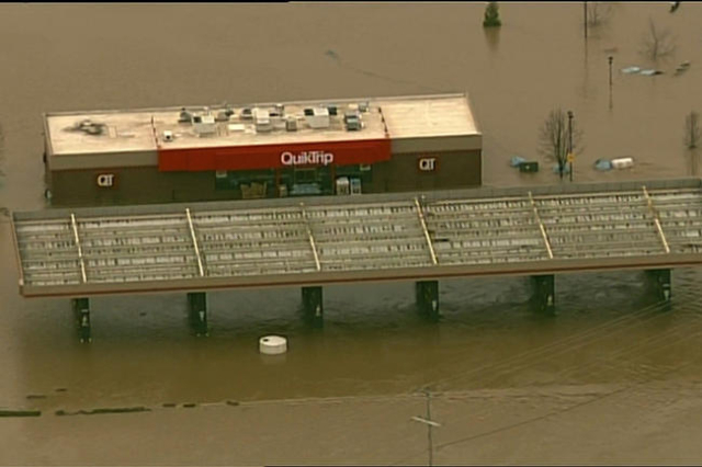 **Embargo: St. Louis, MO**

Flood waters cover businesses over Union, Missouri on Tuesday.
