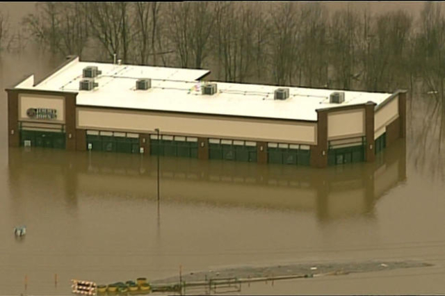 **Embargo: St. Louis, MO**

Flood waters cover businesses over Union, Missouri on Tuesday.