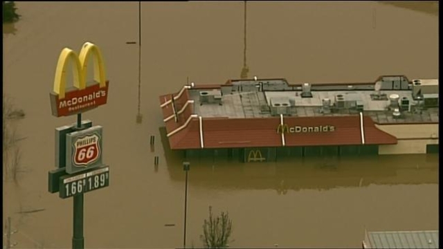 **Embargo: St. Louis, MO**

Flood waters cover businesses over Union, Missouri on Tuesday.