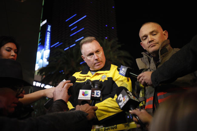 Metro Capt. Peter Bofelli briefs the media about a crash on the Strip in Las Vegas that left one person dead and 37 injured after a car plowed into a group of pedestrians the evening of Sunday, De ...