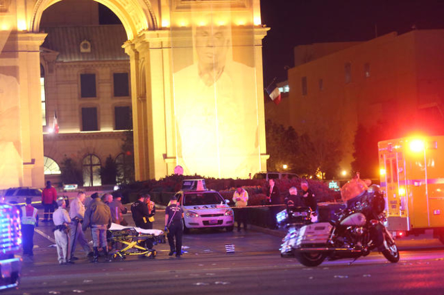 Police investigate the scene of a crash on the Strip in Las Vegas that left one person dead and 37 injured after a car plowed into a group of pedestrians the evening of Sunday, Dec. 20, 2015. Rach ...