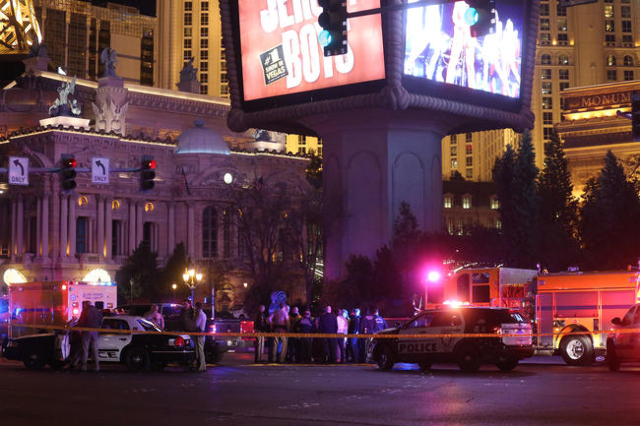 Police investigate the scene of a crash on the Strip in Las Vegas that left one person dead and 37 injured after a car plowed into a group of pedestrians Sunday, Dec. 20, 2015. (Rachel Aston/Las V ...