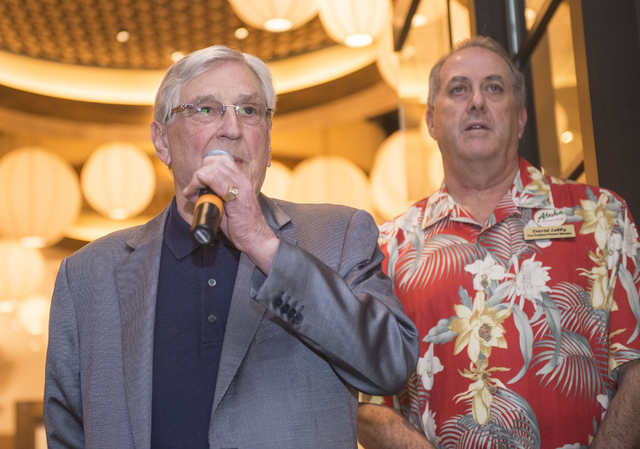 Bill Boyd, executive chairman of Boyd Gaming, addresses a crowd during the grand opening of California Noodle House, as David Lebby, vice president and general manager of the California Hotel and  ...