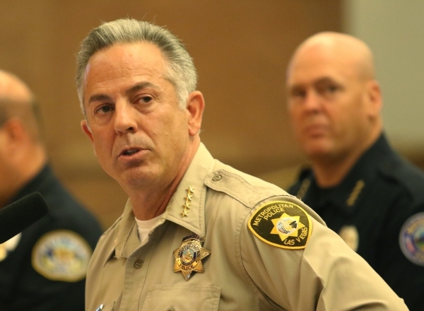 Clark County Sheriff Joseph Lombardo, front, speaks as Mesquite Police Chief Troy Tanner looks on during a public hearing for More Cops sales tax at a County Commission meeting at the commission c ...