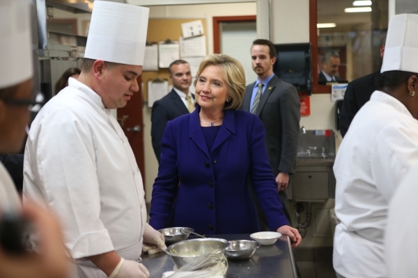 Democratic presidential candidate Hillary Clinton speaks with student Gary Brian Gonzalez during a tour of the Culinary Academy of Las Vegas Wednesday, Jan. 6, 2016, in North Las Vegas. Erik Verdu ...