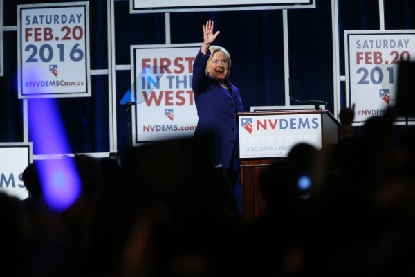 Democratic presidential candidate Hillary Clinton waves at the crowd after delivering her speech during the Battle Born/Battleground First in the West Caucus Dinner at the MGM Grand Conference Cen ...