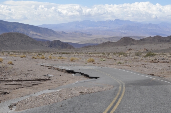 A photo from October shows a flood-damaged section of Badwater Road near Jubilee Pass in Death Valley National Park.  (Courtesy National Park Service)