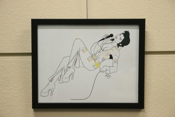 A drawing titled Lady Elvis by Joshua Weinberg is seen on display for an upcoming gallery show titled Pop Culture Pin Ups at the Green Valley Library on Wednesday, Jan. 30, 2015 in Henderson, Nev. ...