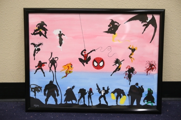 A Spiderman characters silhouette drawing by Joshua Weinberg is seen ready for installation for an upcoming gallery show titled Pop Culture Pin Ups at the Green Valley Library on Wednesday, Jan. 3 ...