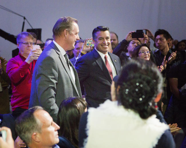 North Las Vegas Mayor John Lee, left, and Nevada Gov. Brian Sandoval are introduced during the unveiling of the Faraday Future FFZero1 prototype at the Las Vegas Village Lot, 3901 Las Vegas Boulev ...
