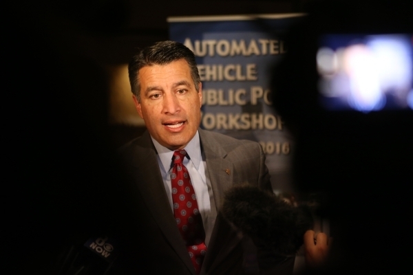 Gov. Brian Sandoval speaks to media during the Automated Vehicle Public Policy Workshop at the Golden Nugget casino-hotel Tuesday, Jan. 5, 2016, in Las Vegas. Erik Verduzco/Las Vegas Review-Journa ...