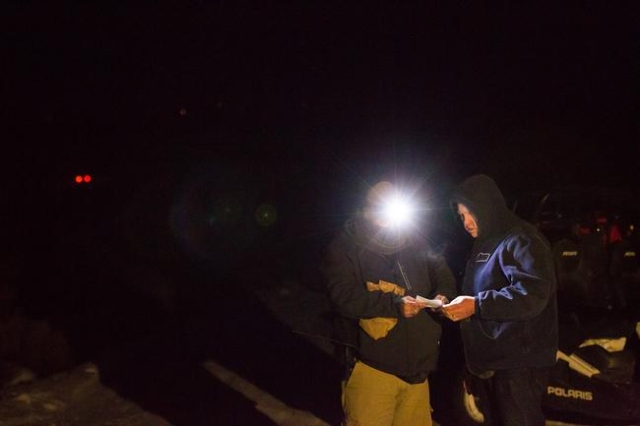 Anti-government protesters guard the entrance of Malheur National Wildlife Refuge, which they are currently occupying, near Burns, Ore. on Sunday, Jan. 3, 2016. (Chase Stevens/Las Vegas Review-Jou ...