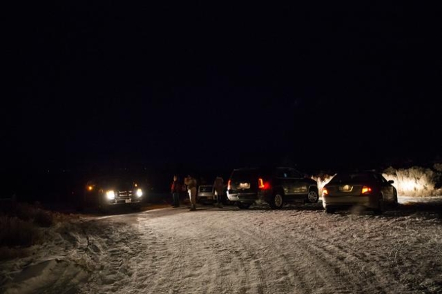 Anti-government protesters stand by the entrance of Malheur National Wildlife Refuge, which they are currently occupying, near Burns, Ore. on Sunday, Jan. 3, 2016. The protestors, many of them arm ...
