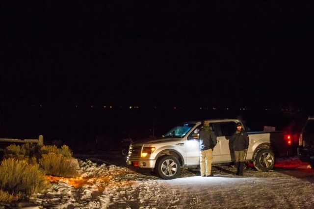 Anti-government protesters guard the entrance of Malheur National Wildlife Refuge, which they are currently occupying, near Burns, Ore. on Sunday, Jan. 3, 2016. (Chase Stevens/Las Vegas Review-Jou ...