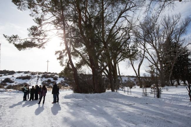 Members of the Johnson and Keady families of Burns, Ore. explore the Malheur National Wildlife Refuge headquarters, which is occupied by anti-government protestors, on Monday, Jan. 4, 2016. The fa ...