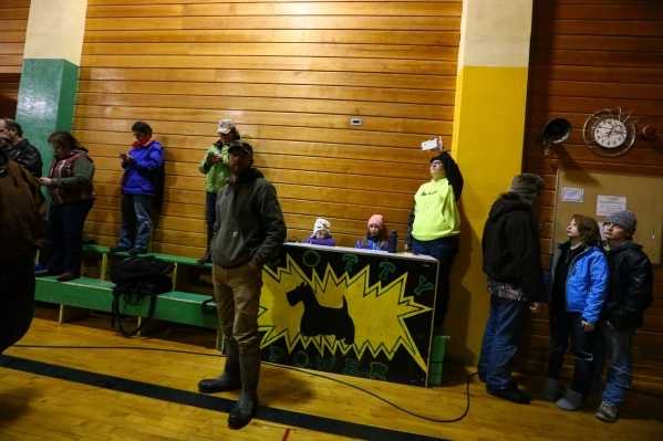 Area residents and news media look on during a a news conference held by the Harney County sheriff at Lincoln Junior High School in Burns, Ore. on Monday, Jan. 4, 2016. Law enforcement has set up  ...