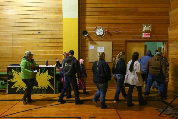Area residents leave after a a news conference held by the Harney County sheriff at Lincoln Junior High School in Burns, Ore. on Monday, Jan. 4, 2016. Law enforcement has set up at the school in r ...