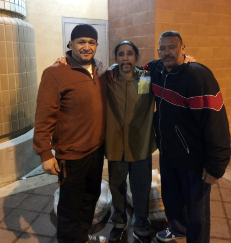 Jesus Meraz, center, stands with an unidentified cousin, left, and his uncle, Mike Valenzuela, after being released from the Clark County Detention Center on Monday, Jan. 4, 2016. Meraz spent more ...