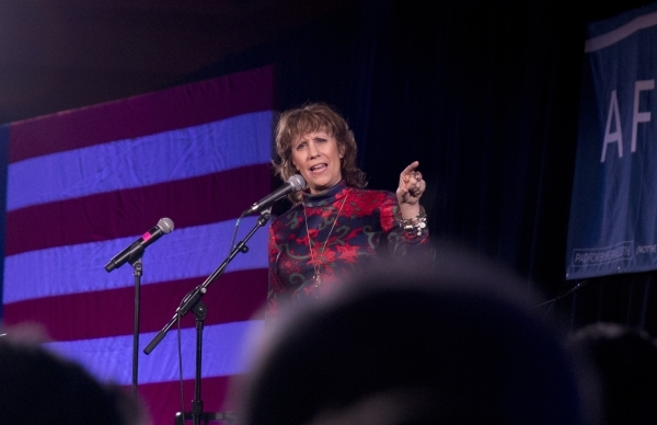 Comedian and co-creator of The Daily Show Lizz Winstead speaks to the crowd during the "Future to Believe In" rally supporting Democratic presidential candidate Sen. Bernie Sanders insid ...