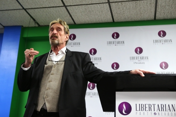 John McAfee, computer programmer and developer running for the Libertarian Party nomination for president, speaks during a press conference at the Libertarian Party of Nevada Headquarters on Frida ...