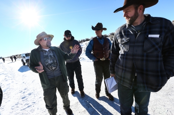 Steve Atkins, left, of Burns, Ore. voices his discontent over the occupation with Ammon Bundy, right, at Malheur National Wildlife Refuge headquarters near Burns, Ore. on Friday, Jan. 8, 2016. Bun ...