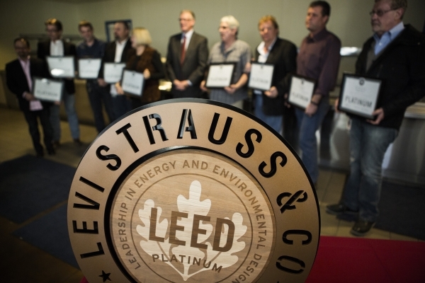 Levi Strauss & Company honored employees stand for photo with Henderson Mayor Andy Hafen at the  Levi Strauss & Company‘s Sky Harbor Distribution Center, 501 Executive Airport Drive, ...