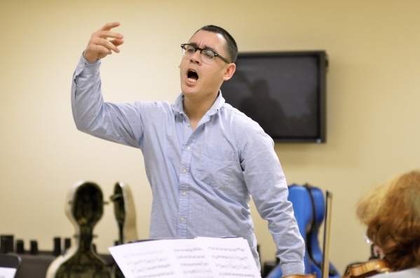 Conductor Yunior Lopez leads a Young Artists Orchestra rehearsal at the Adelson Clinic at 3661 Maryland Parkway in Las Vegas on Friday, Jan. 15, 2016. Bill Hughes/Las Vegas Review-Journal