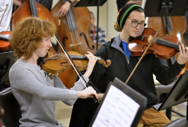 Yestyn Griffith, left, and Drake Manzanares perform during a Young Artists Orchestra rehearsal at the Adelson Clinic at 3661 Maryland Parkway in Las Vegas on Friday, Jan. 15, 2016. Bill Hughes/Las ...