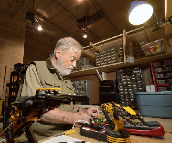 Mike Clark works on coming up with a better way to control a robot arm at the Syn Shop at 1075 American Pacific Drive in Henderson on Wednesday, Jan. 13, 2016. Bill Hughes/Las Vegas Review-Journal