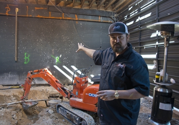 Lance Johns explains how renovations for Atomic Kitchen will work inside the garage immediately next door to Atomic Liquors in Downtown Las Vegas on Friday, Jan. 15, 2016. His project is experienc ...