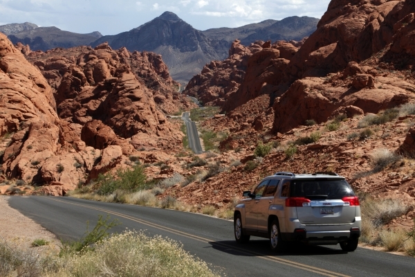 A car passes through the Valley of Fire on Saturday, June 13, 2015, in Overton. Nevada opened up all 23 of their state parks for one day without an admission fee. (James Tensuan/Las Vegas-Review J ...