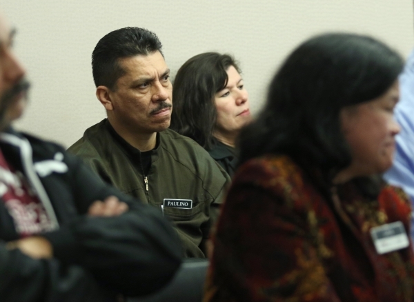 Green Valley Ranch employee Palino Martinez, second from left, sits among other Stations Casino employees at a Gaming Control Board hearing at Grant Sawyer building Thursday, Jan. 21, 2016, in Las ...
