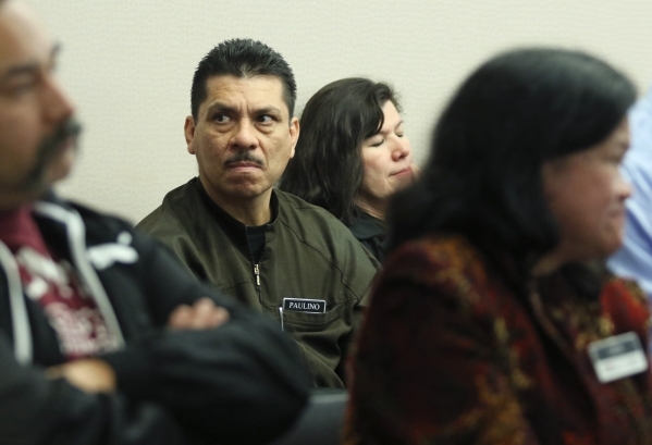 Green Valley Ranch employee Palino Martinez, second from left, sits among other Stations Casino employees at a Gaming Control Board hearing at Grant Sawyer building Thursday, Jan. 21, 2016, in Las ...