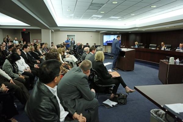Station Casinos chief financial officer Marc Falcone speaks before the Gaming Control Board hearing at Grant Sawyer building Thursday, Jan. 21, 2016, in Las Vegas. The board signed off on Station ...