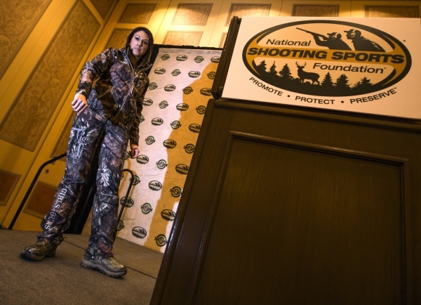 Norissa Harman, co-owner of Girls With Guns, models the latest line of hunting clothing during the Shot Show at the Sands Expo on Wednesday, Jan. 20, 2016. Jeff Scheid/Las Vegas Review-Journal Fol ...