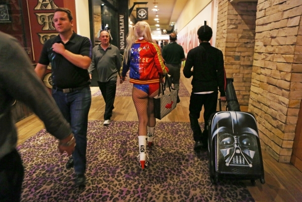 People walk through the hallway outside the AVN Adult Entertainment Expo 2016 at Hard Rock hotel-casino Friday, Jan. 22, 2016, in Las Vegas. The four-day expo featured adult entertainers, merchand ...