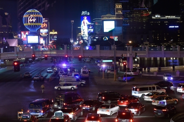 Strip traffic is detoured as Las Vegas police investigate a shooting along Las Vegas Boulevard in front the of the Bellagio hotel-casino on Friday, Jan. 22, 2016, in Las Vegas. David Becker/Las Ve ...
