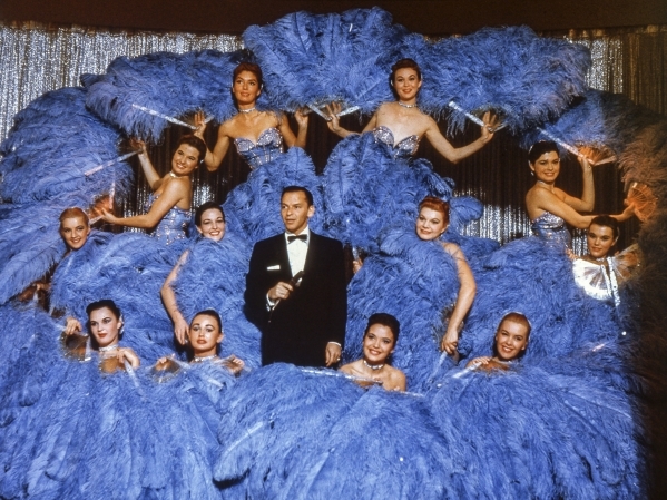Frank Sinatra with the Copa Girls, Blue Fan number, Circa 1950-1954. DUPLICATE-BEST QUALITY. CREDIT: Don Knepp/Las Vegas News Bureau
