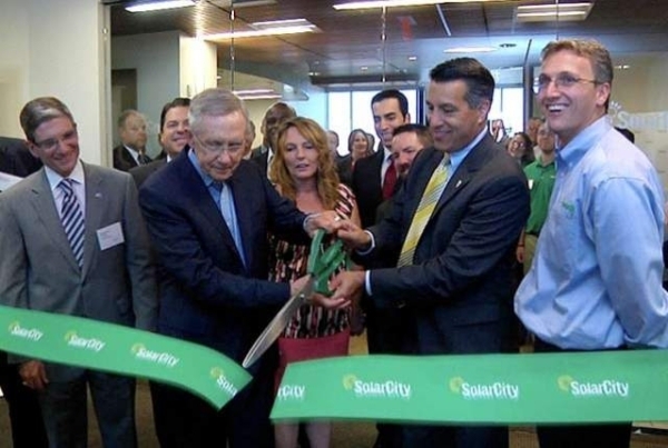 From left, U.S. Rep. Joe Heck, U.S. Sen. Harry Reid and Gov. Brian Sandoval cut the ribbon for the new SolarCity office at Town Square in Aughts 2013. Recently, the Nevada Public Utilities Commiss ...