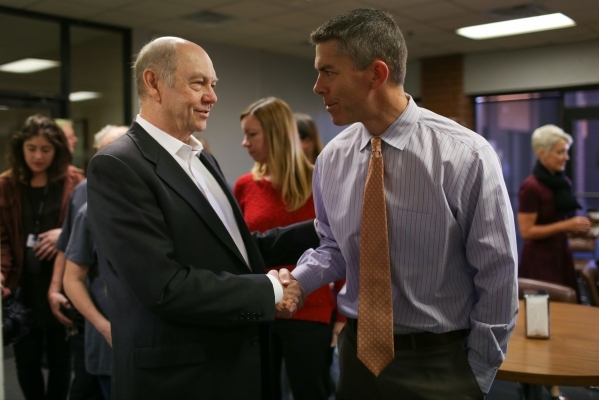 Las Vegas Review-Journal publisher Craig Moon, left, shakes hands with Interim Editor Glenn Cook after a staff meeting Jan. 28, 2016, at the newspaper in Las Vegas. Brett Le Blanc/Las Vegas Review ...