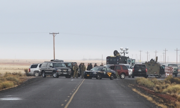A police roadblock is shown just outside of the Malheur National Wildlife Refuge headquarters, where four anti-government protesters remain, about 30 miles south of Burns, Ore., on Thursday, Jan.  ...