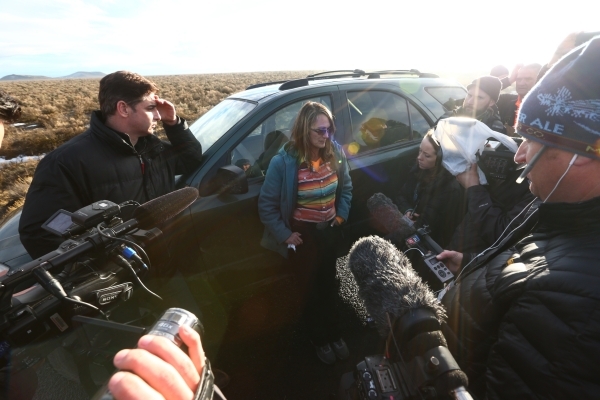 Barbara Berg, center, speaks with news media outside of of the Malheur National Wildlife Refuge headquarters, where four anti-government protesters remain, about 30 miles south of Burns, Ore., on  ...