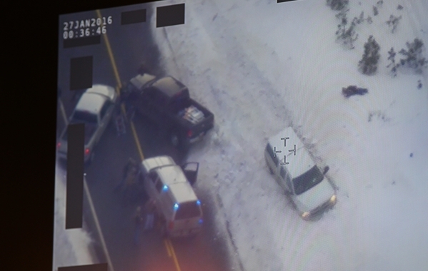 A still photograph of a video shown by the FBI depicts Arizona rancher Lavoy Finicum, right, on the ground after being shot by law enforcement officers outside of Burns, Ore., on Thursday, Jan. 28 ...